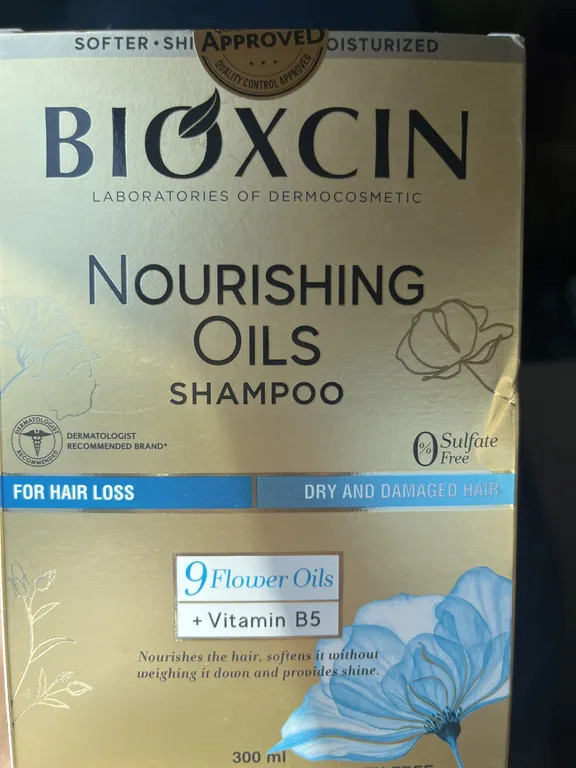 شامپو تقویتکننده و ترمیمکننده مو بیوکسین مدل Nourishing Oils Care حجم 300 میلیلیتر